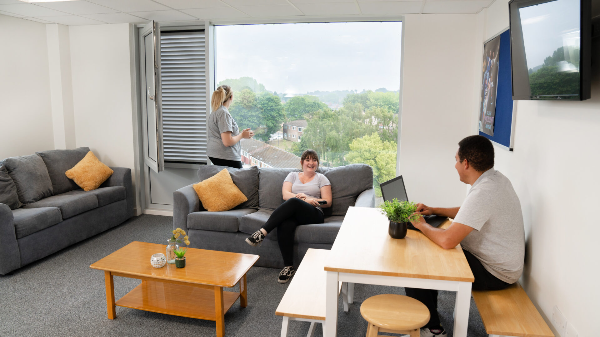 Students in the shared living room of Cofton Halls