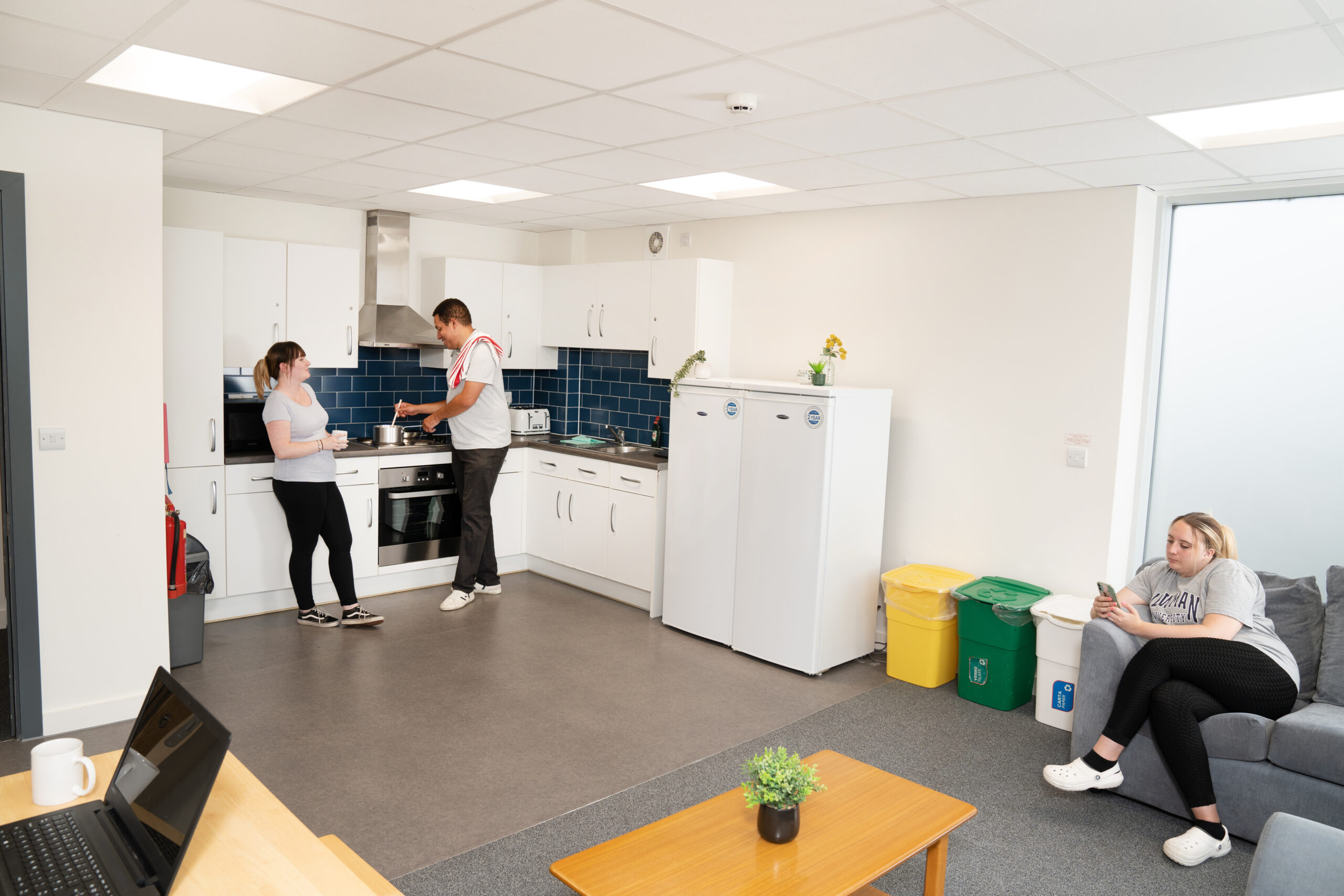 Students in the shared kitchen of Cofton Hall